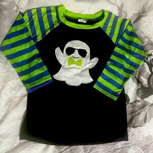 Long sleeve shirt. The size is 6/7T 
Only worn once
Bought from online Boutique